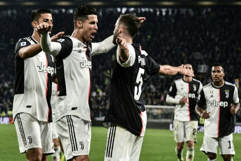Ronaldo and Pjanic both got on the scoresheet in Juve's win over Bologna. AFP