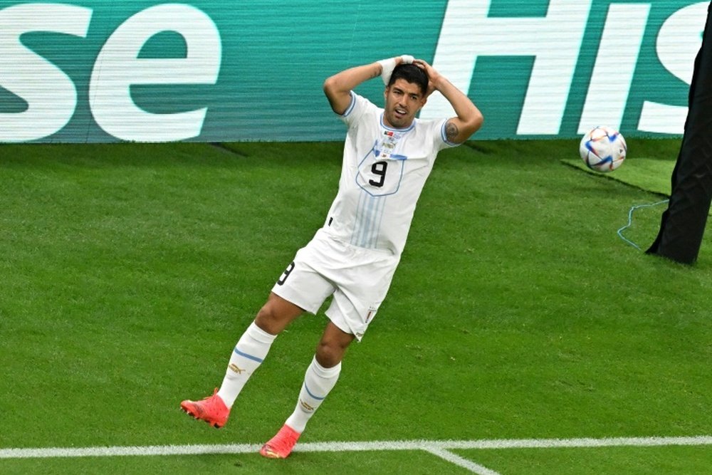 Suarez has no regrets about his World Cup handball 12 years ago against Ghana. AFP