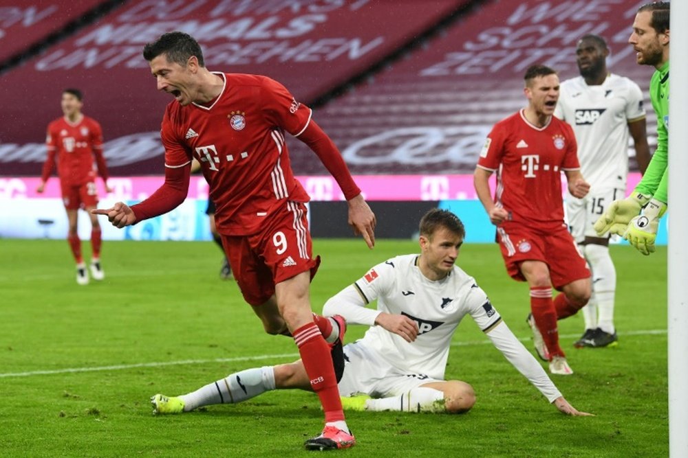 Robert Lewandowski (L) scored as Bayern beat Hoffenheim. AFP