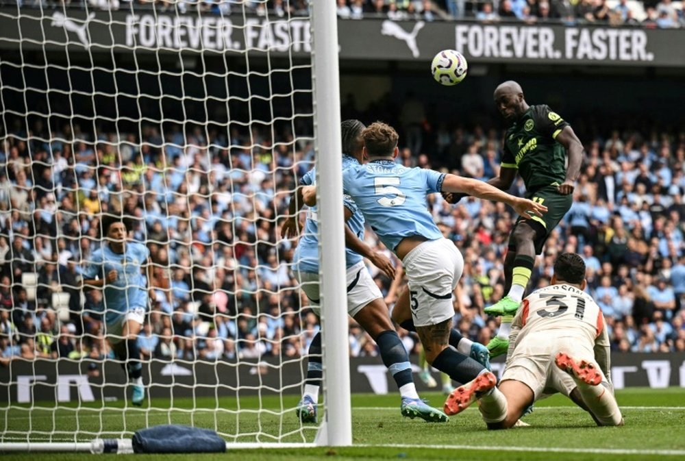 Wissa heads Brentford into an early lead at Manchester City. AFP
