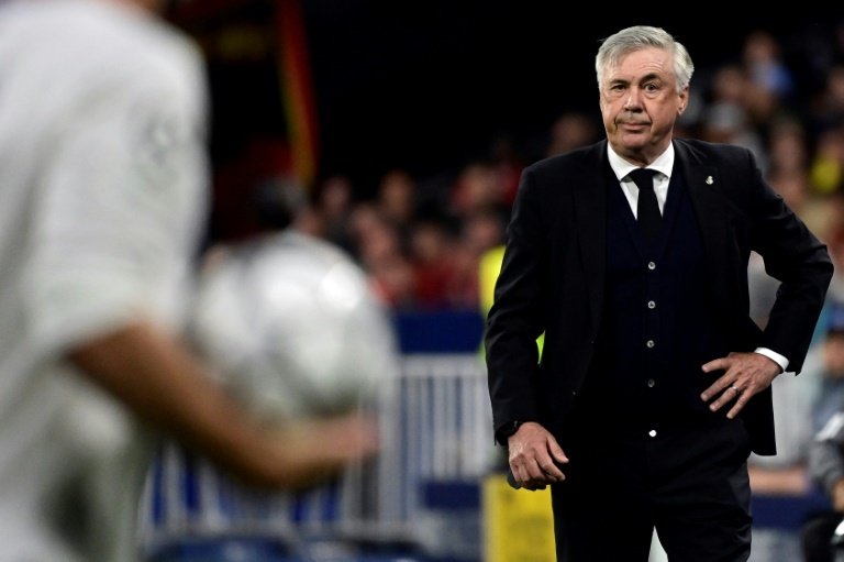 'Record man' Ancelotti puts his landmark down to luck