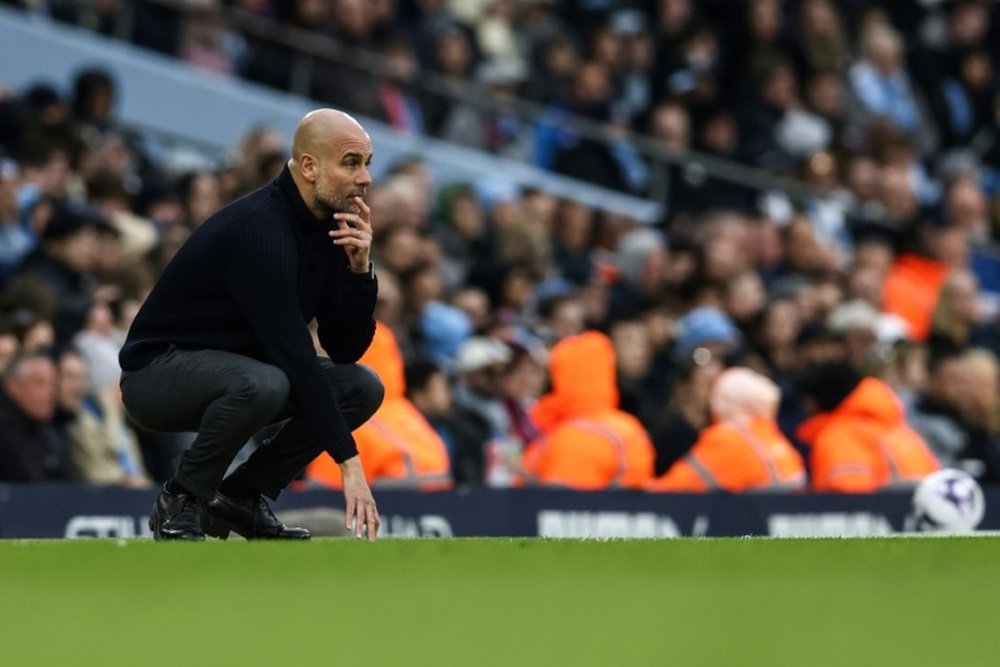 Defending champions Man City trail leaders Liverpool by three points. AFP