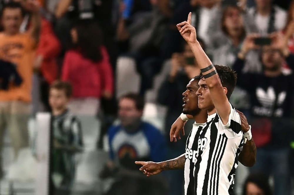 Juve are now on the brink of claiming the title. AFP
