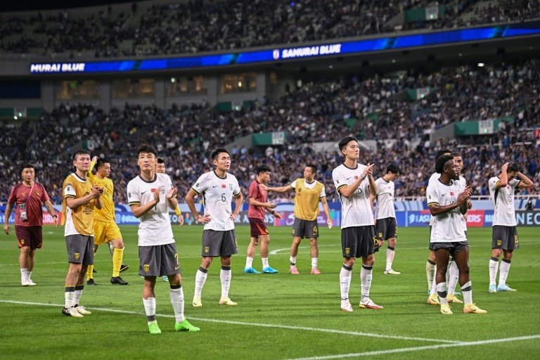 Chinese football numb after 'disastrous' 7-0 Japan defeat