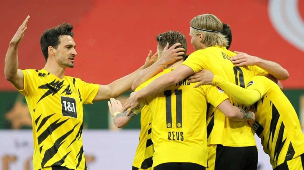 Marco Reus (C) scored as Dortmund secured a CL spot. AFP