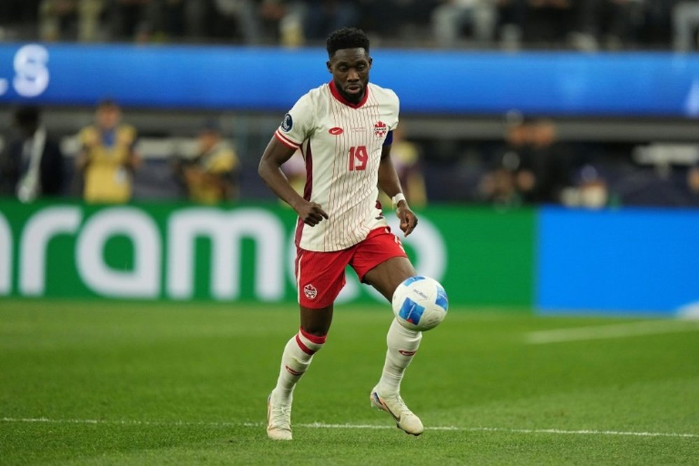 Bayern Munich left-back Alphonso Davies returned to training with the ball on Monday. AFP