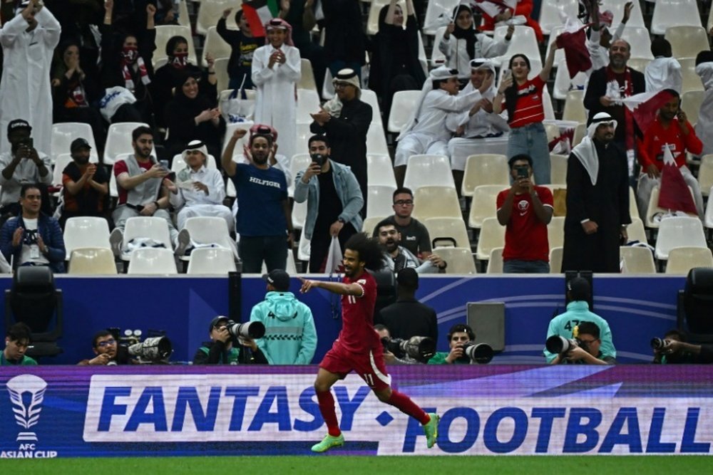 Qatar's forward Akram Afif scored his team's third. AFP