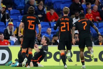 Wout Weghorst (C) got a late winner for the Netherlands at the death. AFP