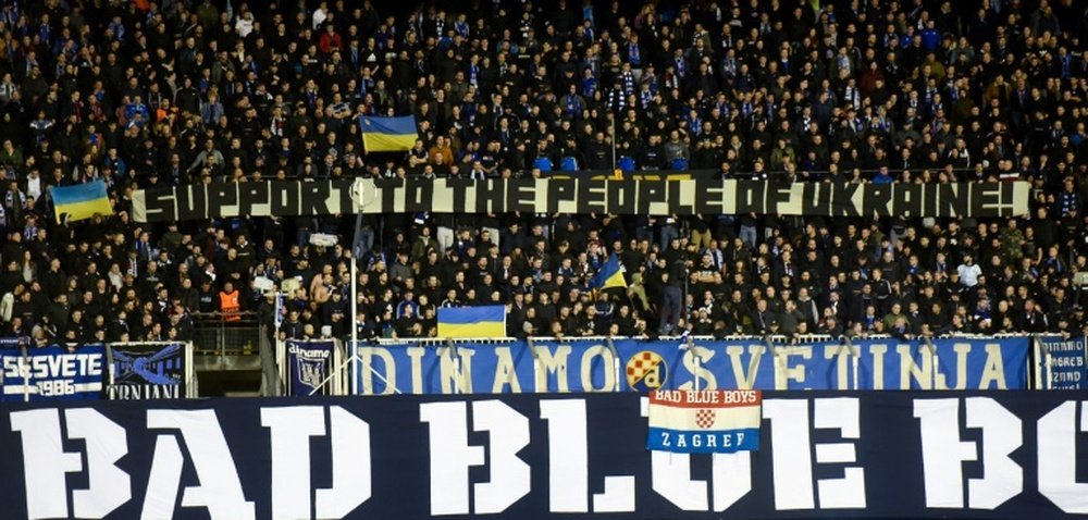 Dinamo Zagreb supporters hold a banner in support of Ukraine during their 1-0 win over Sevilla. AFP
