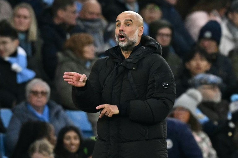 Pep Guardiola takes his team to Real Madrid on Wednesday. AFP