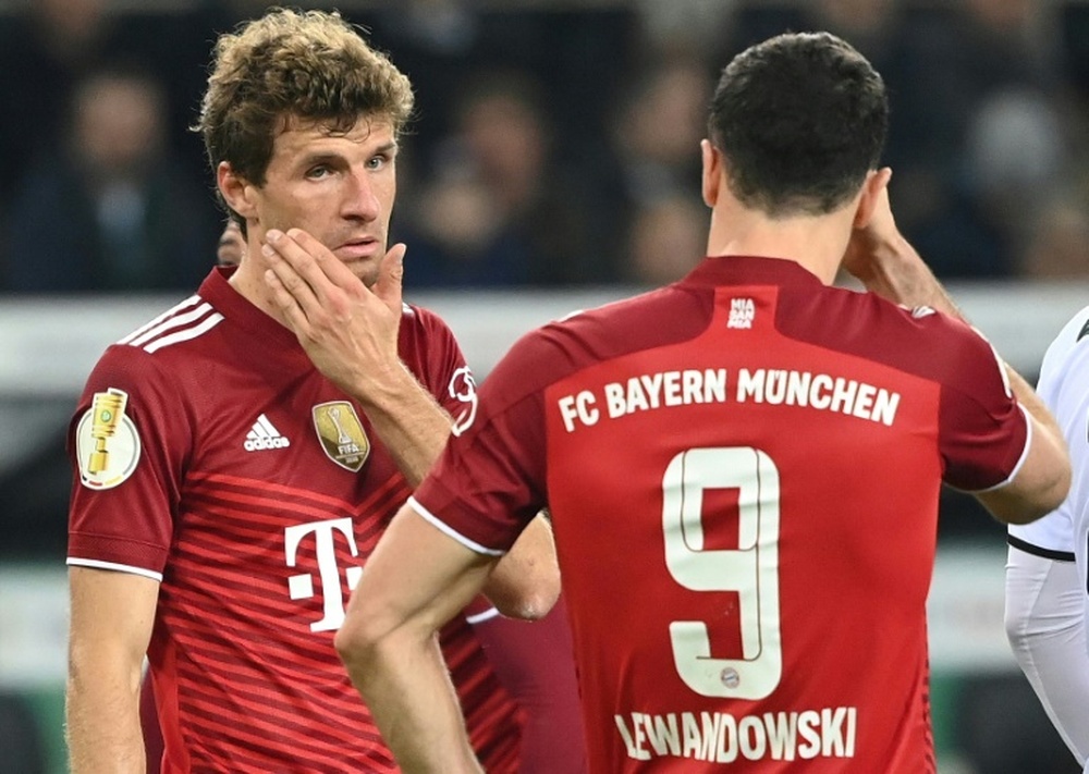 Thomas Muller (L) says Lewandowski should win the Ballon d'Or. AFP