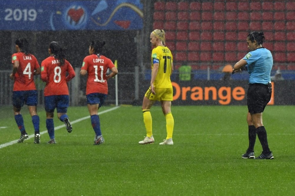 Torrential rain forced a break in play in Rennes. AFP