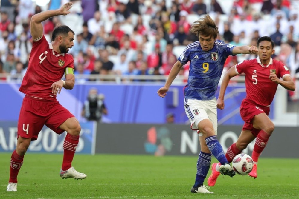 Japan will now face the winners of Group E in the Asian Cup last 16. AFP