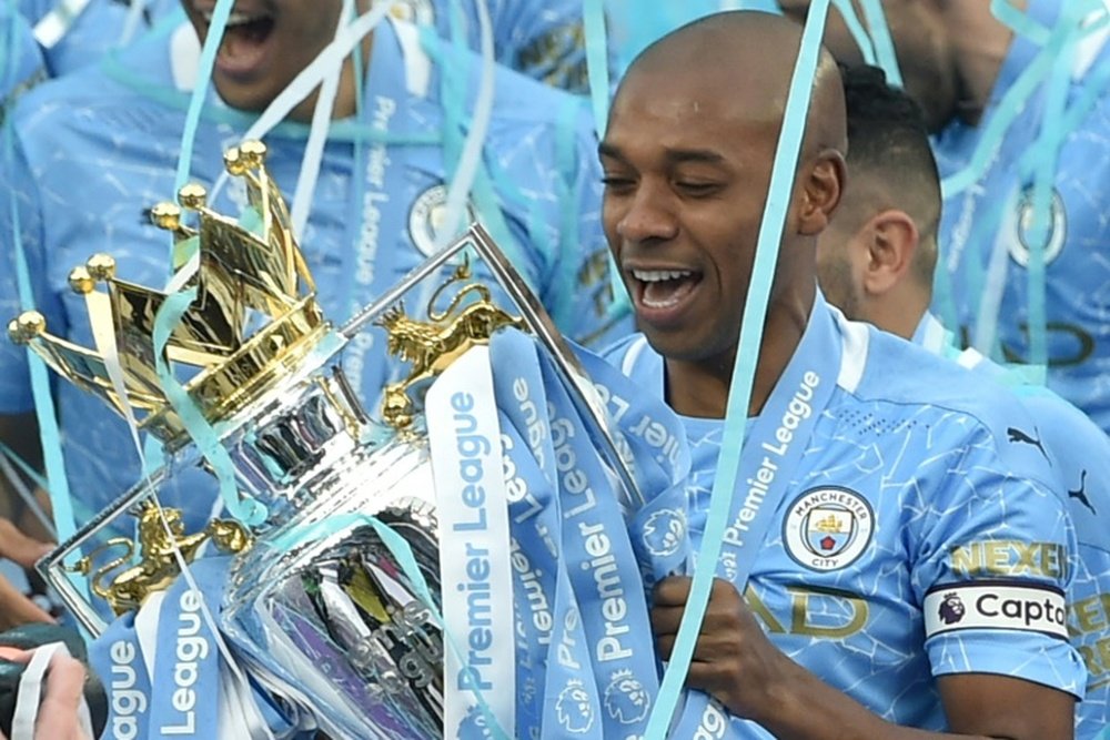 City legend Fernandinho has signed for another year with the club. AFP