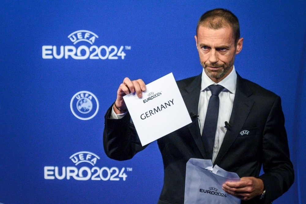 UEFA president Aleksander Ceferin unveiling Germany as hosts of Euro 2024 during a ceremony. AFP