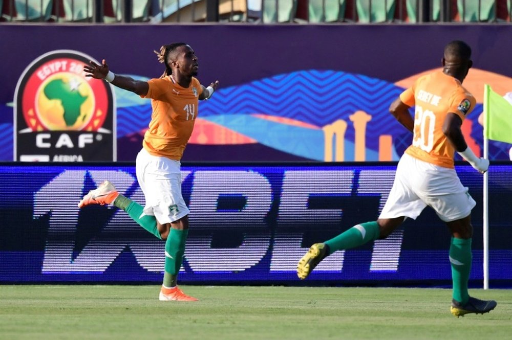 Jonathan Kodjia celebrates the winner for Ivory Coast. AFP