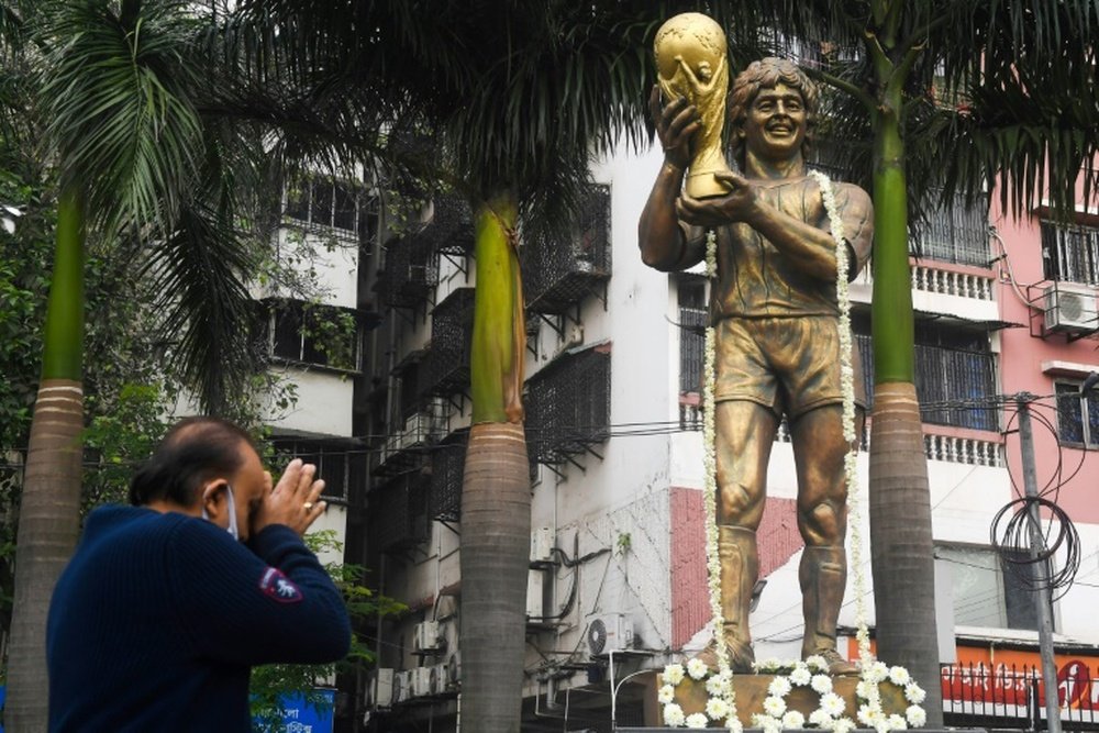 India football stronghold mourns 'Our God' Diego. AFP