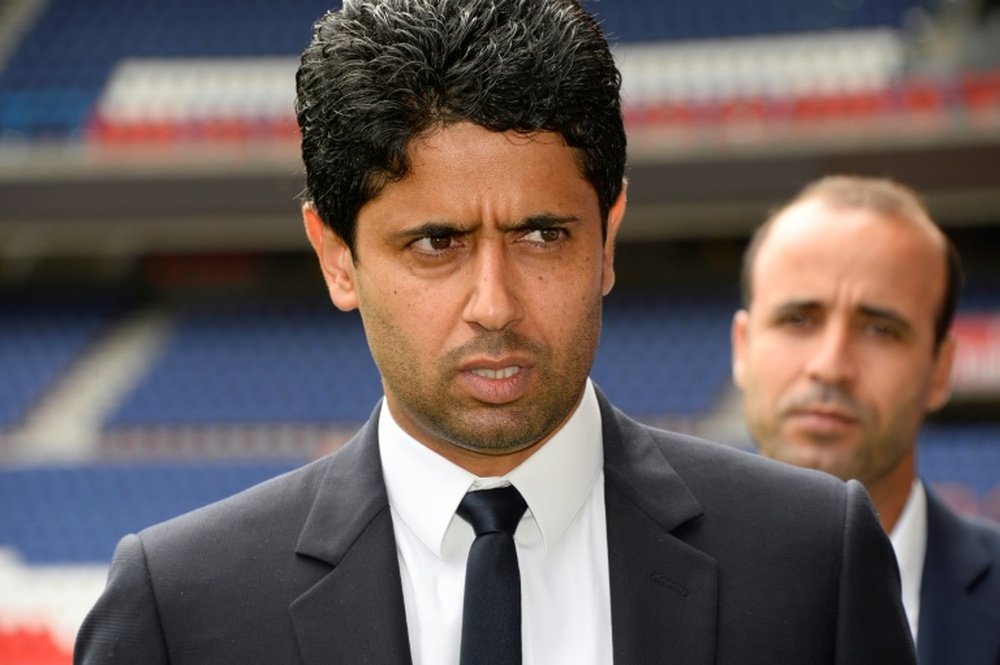 Nasser Al-Khelaifi (L) is prominent now as president of Paris Saint-Germain