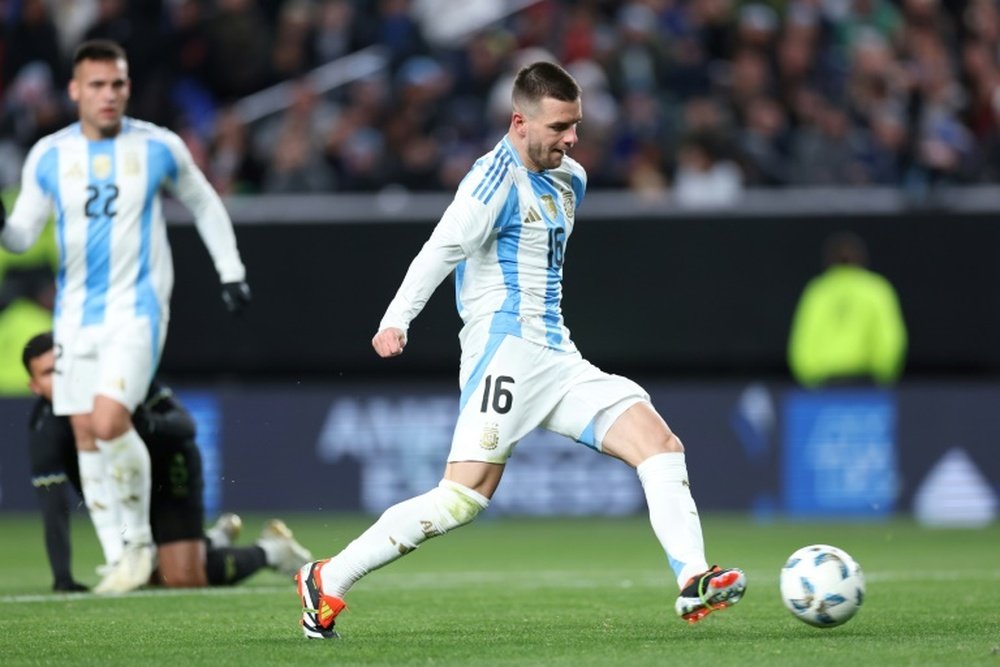 Lo Celso scores a goal in a 3-0 victory over El Salvador. AFP