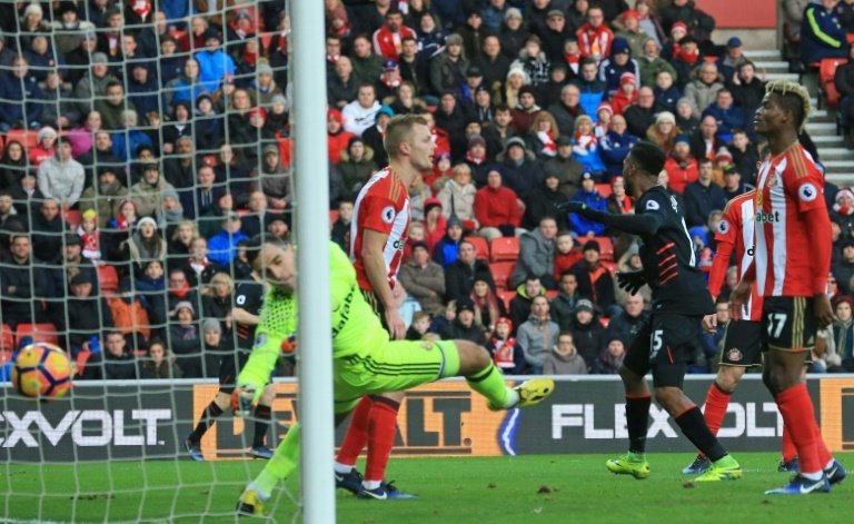 Liverpools striker Daniel Sturridge (3rd R)celebrates after scoring in the English Premier League football match between Sunderland and Liverpool at the Stadium of Light in Sunderland, north-east England on January 2, 2017