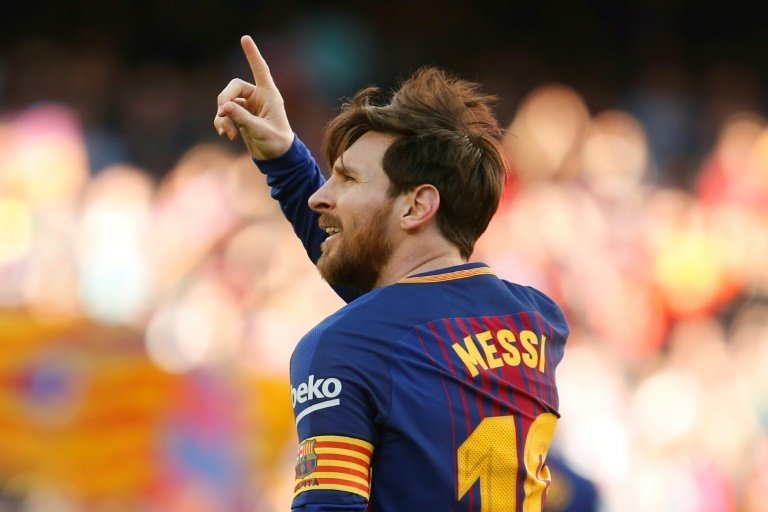 Messi takes Barcelona 11 points clear, Ronaldo hits four