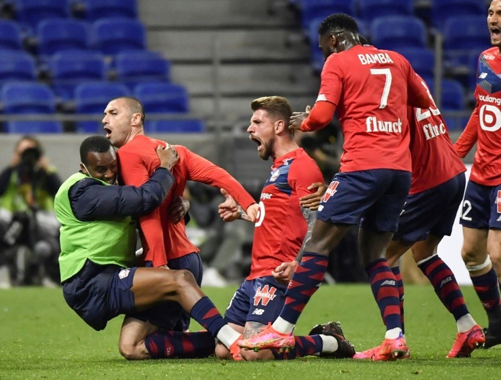 Yilmaz-inspired Lille fight back against Lyon to retake top spot. AFP
