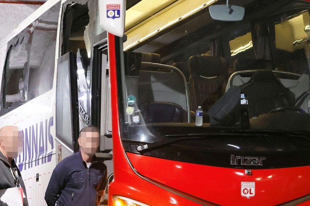 The Lyon team bus was clearly damaged in the attack. AFP