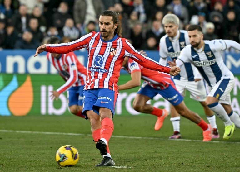 Antoine Griezmann missed a late penalty as La Liga leaders Atletico Madrid stumbled to a shock 1-0 defeat at Leganes on Saturday, ending a club record run of 15 consecutive victories.