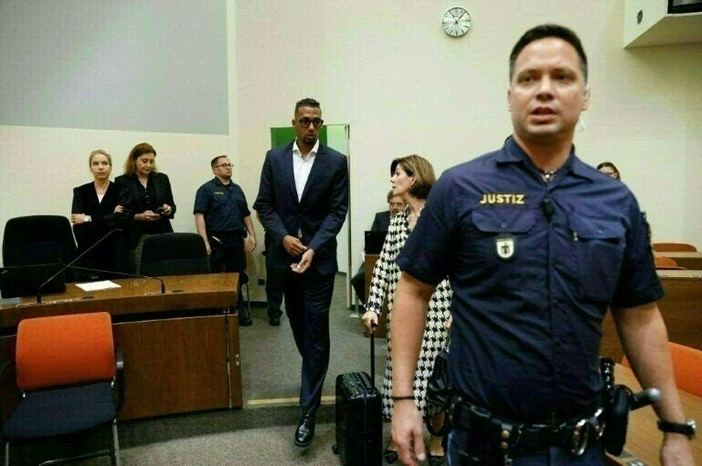 Boateng (C) arrived at a Munich court on Friday for a retrial. AFP