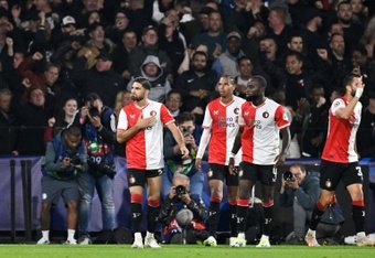A ruthless Feyenoord beat an indisciplined Celtic 2-0 in a scrappy Champions League Group E encounter Tuesday with the Scottish champions hit by two red cards in the space of five minutes.