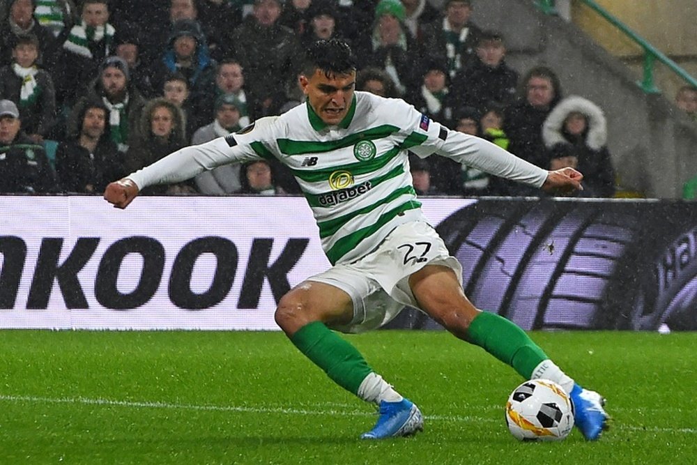 Mohamed Elyounoussi got three goals as Celtic won 1-4 at Motherwell. AFP