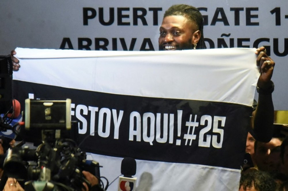 Hundreds of Olimpia fans welcome Adebayor to Paraguay. AFP