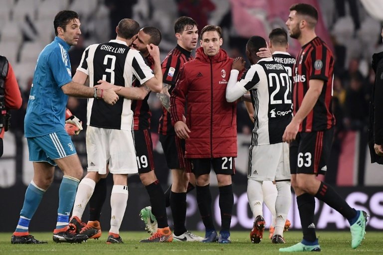 Juventus pull clear with Milan victory