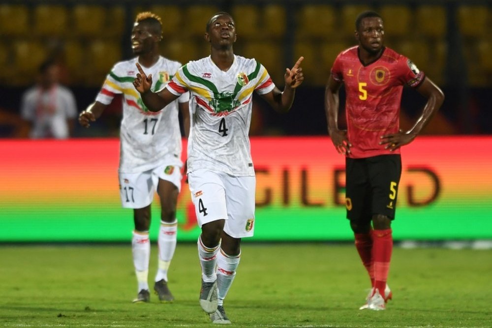 Mali topped the group after beating Tunisia, who also qualify. AFP