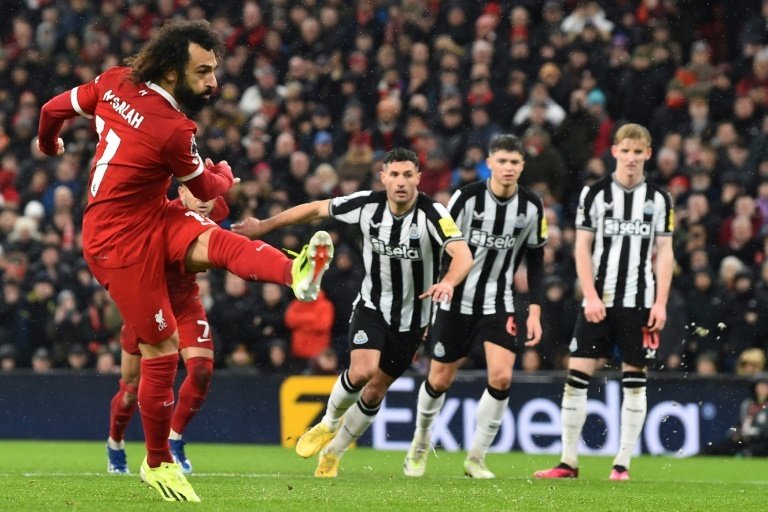 Salah scored twice after missing a first-half penalty against Newcastle. AFP