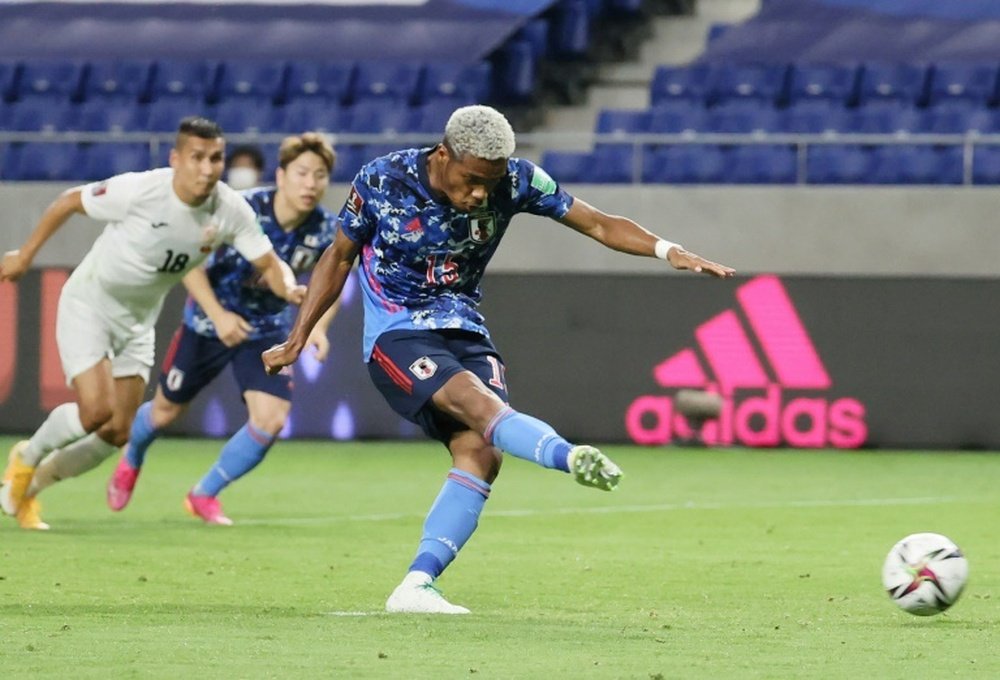 Japan's Ado Onaiwu opened the scoring from the penalty spot. AFP