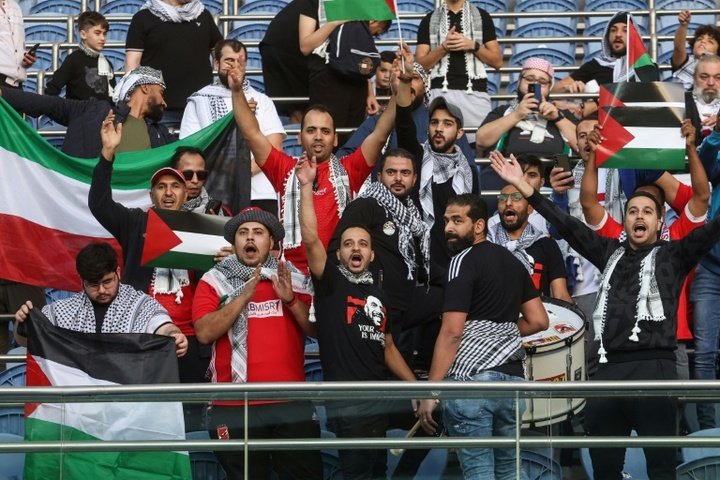 Palestinians raise flag in emotional World Cup qualifier