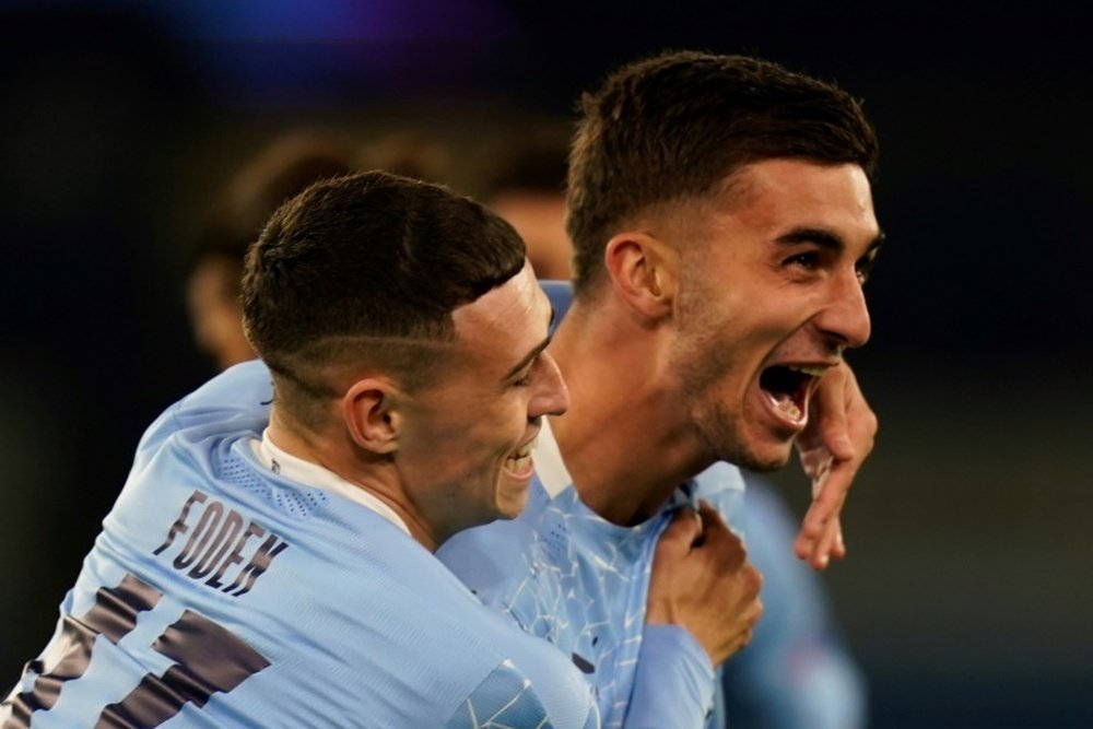 Phil Foden (left) and Ferran Torres (right)combined for Man Citys third goal. AFP