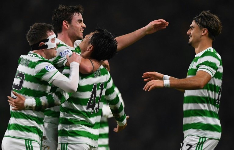 Rampant Celtic thrash Motherwell to open up four point lead