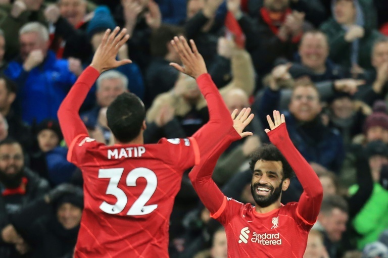 ï»¿Liverpool overwhelm Leeds and near gap on Man City
