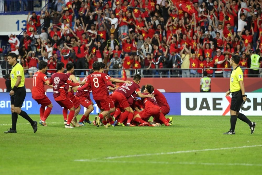 Vietnam came through a penalty shoot out to reach the quarter-finals. AFP