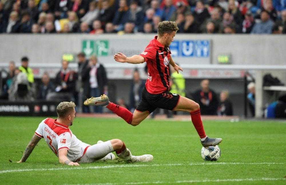 Freiburg up to third after comeback win at Duesseldorf. AFP