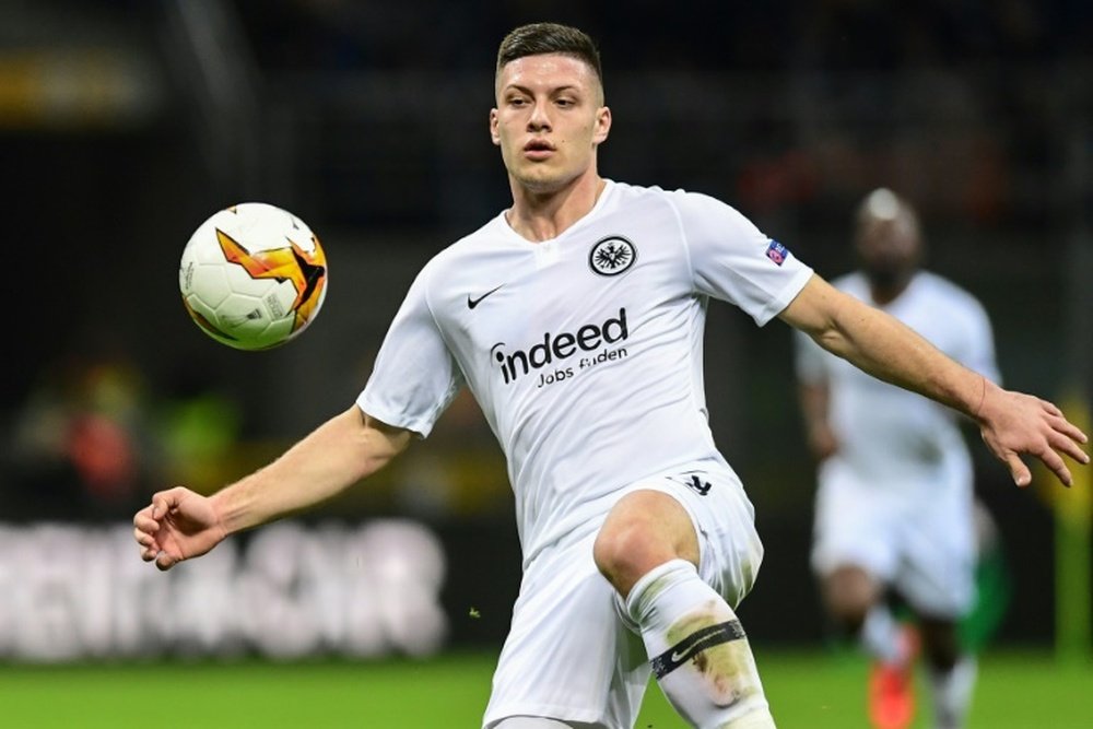 Barca target Jovic to stay at Frankfurt, says father. AFP