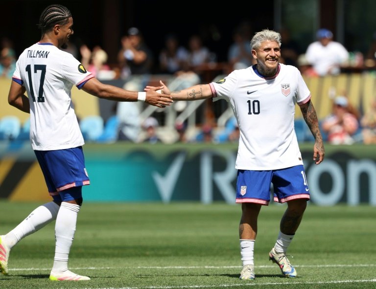 USA end losing streak with crushing of Trinidad
