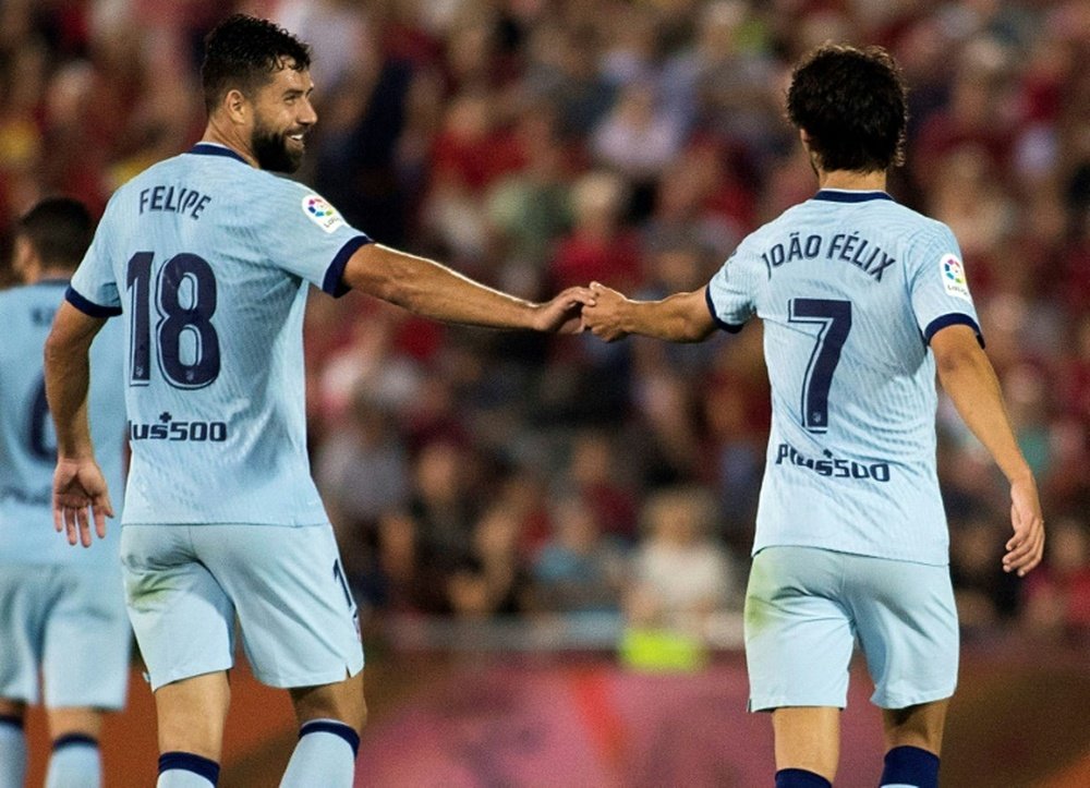Felix (R) scored in Atletico Madrid's win on the island of Mallorca. AFP
