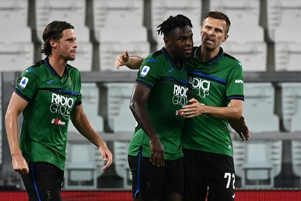Atalanta only got a draw at Verona despite Duvan Zapata's (C) goal. AFP