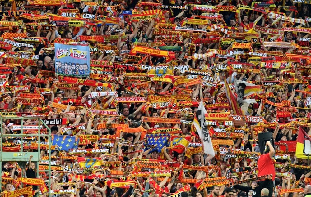 Lens are back in Ligue 1, but fans will be locked out for some time. AFP