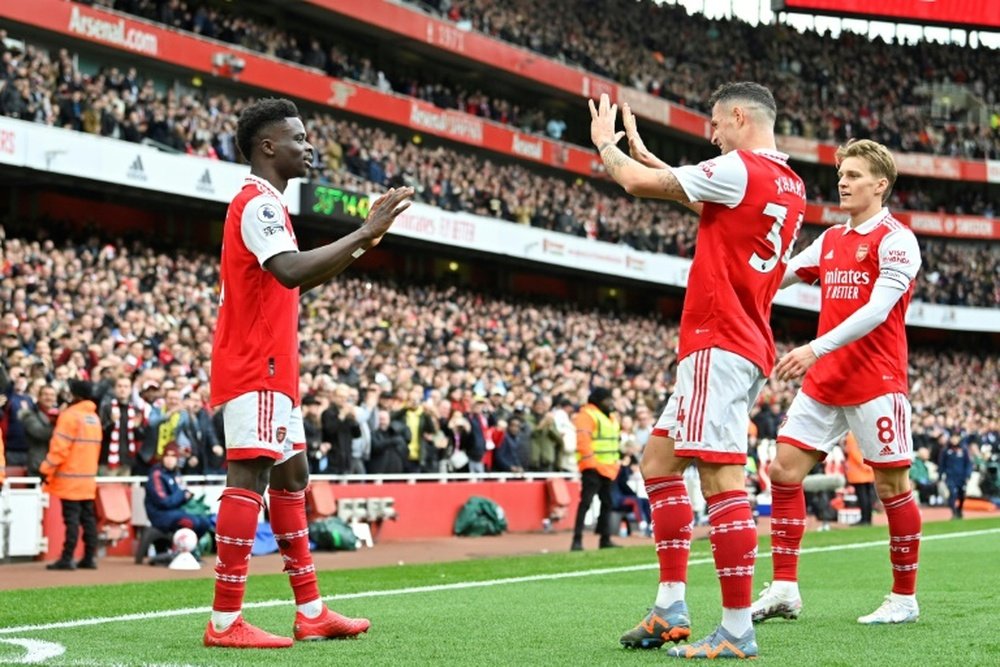 Arsenal are in pole position to win their first title since 2004. AFP