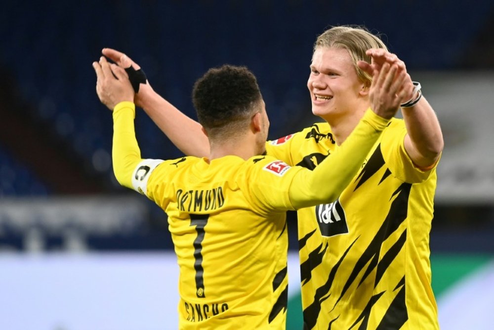 Haaland (R) and Sancho both scored in Dortmunds derby win. AFP