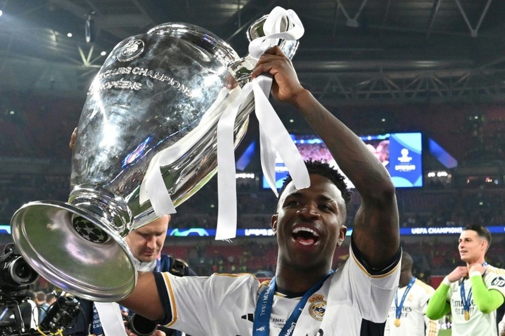 Vinicius Jr lifted his second UCL trophy with just 23 years old. AFP
